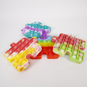 Pop it Fidget Spielzeug, 25 Pops Silikon Puzzle Bunt, 12 x 12 cm, Stresslos, Jonotoys